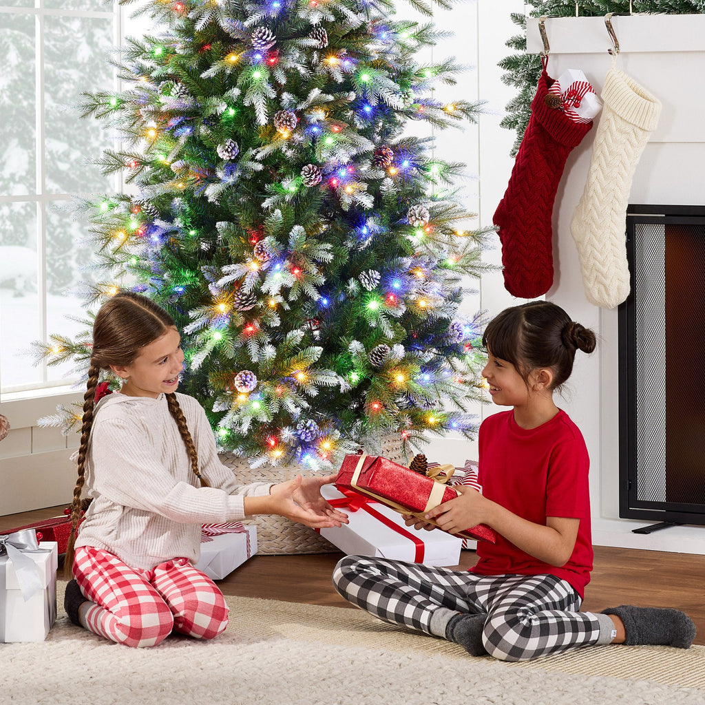 Pre-Lit Artificial Flocked Slim Aspen Noble Fir Christmas Tree with Stand for indoor and outdoor holiday displays